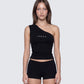Women's black top styled on model – FINESSE
